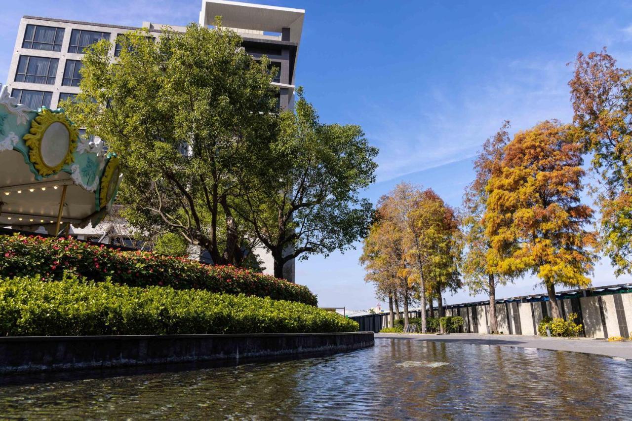 Hsin Hotel Цзяї Екстер'єр фото The campus of the University of Jinan